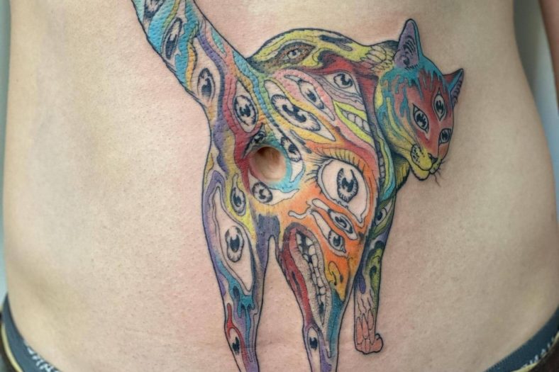 cat belly button tattoo